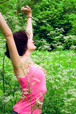 female in summer forest