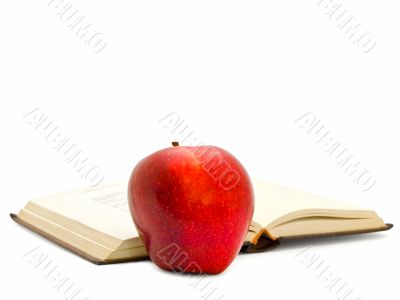 apple near the book