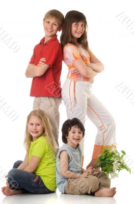 Four children with flowers