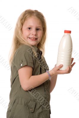 The girl with a bottle of milk