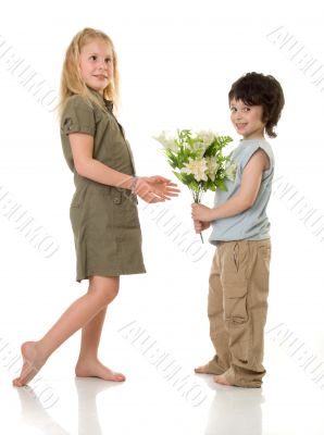 Two children with flowers