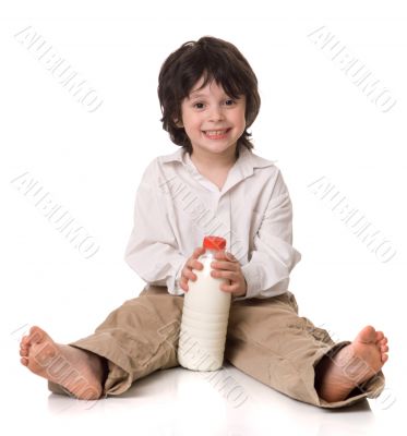 The boy with a bottle of milk