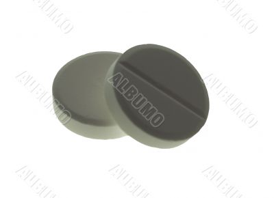 Two big medical tablets with the isolated background