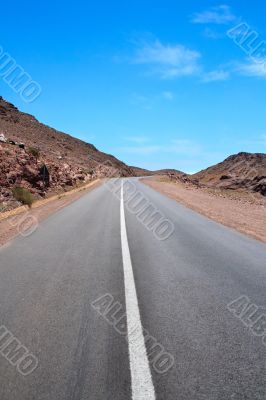 on an empty road up the mountain pass