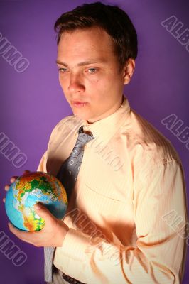 Businessman with globe in his hands