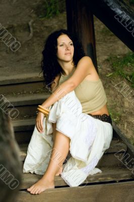 attractive woman on wooden stairs