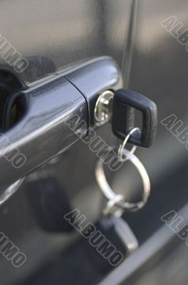 Car Keys Hanging From Car Door