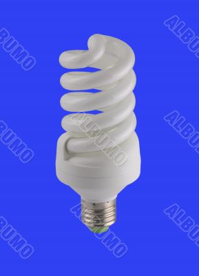 Energy-saving lamp isolated on blue background