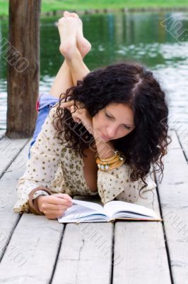 beautiful woman reading a book