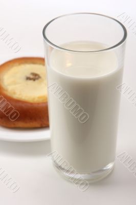 glass with milk and cheese-cake