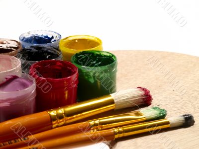 paintbrushes on the wooden palette