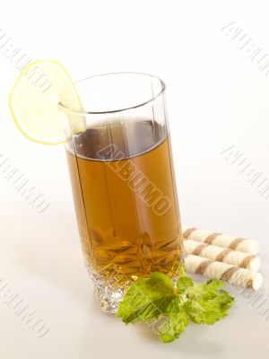 breakfast still-life. green tea with cookies and fresh mint