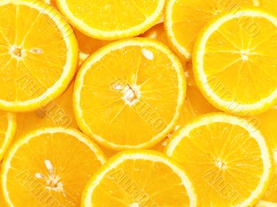 fresh tasty oranges as background on the stack