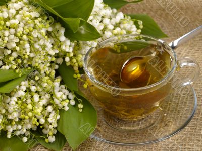 Morning in the village. Still-life with lily of the valley