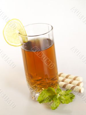 breakfast still-life. green tea with cookies and fresh mint