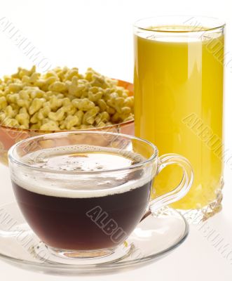 Orange juice corn flakes and espresso cup