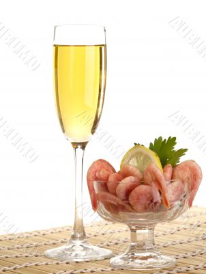 white wine with  shrimps bowl on the table