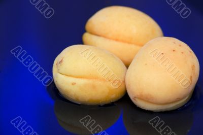 Apricot on blue water