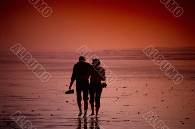 Couple Walking On the Beach