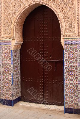 Old decorated gate in Marrakkech