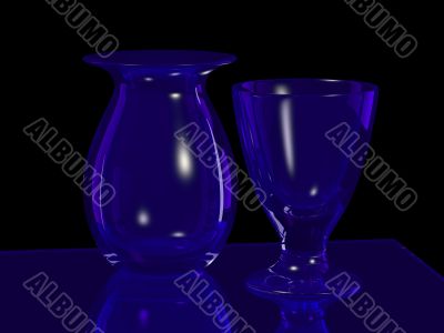 blue glass vase and goblet