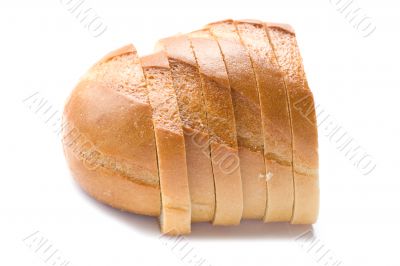 Cutting white bread closeup