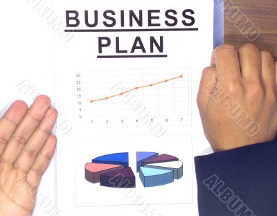 man presents business plan