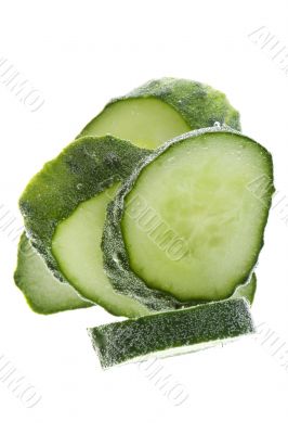 Cut cucumber in water macro