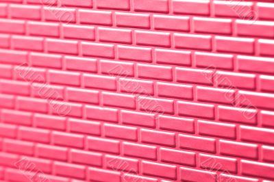 Wall of metallic bricks