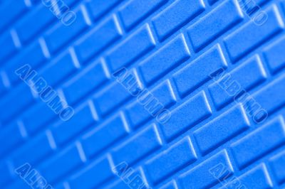 Wall of metallic bricks