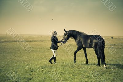 horsewoman trains the horse / split vintage toned