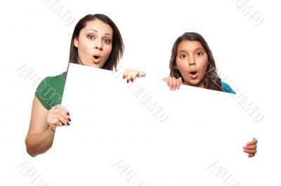 Pretty Hispanic Girl and Mother Holding Blank Board