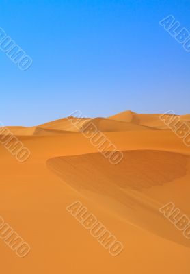 sand dunes and cloudless sky
