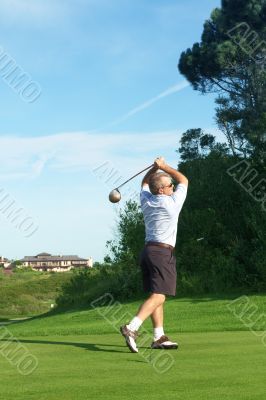 Senior golfer playing golf