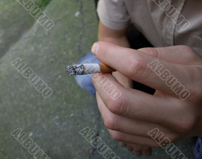 Closeup of a half smoked cigarette