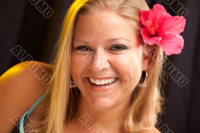 Beautiful Girl with Hibiscus in Her Hair