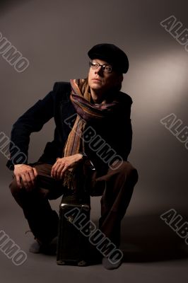 man in cap and glasses