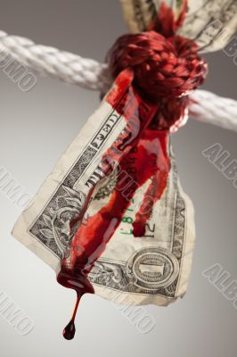 Wrinkled American Dollar Bleeding in Rope