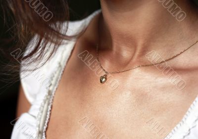Female neck with a chain