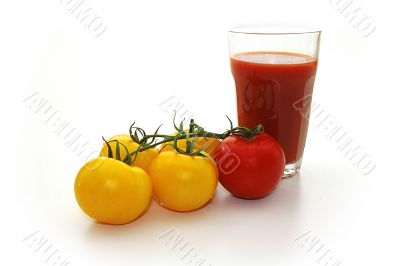Yellow tomatos and red tomato, juice