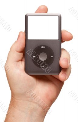 Man`s Hand Holding Electronic Gadget