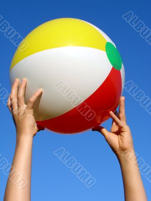 hands with beach ball
