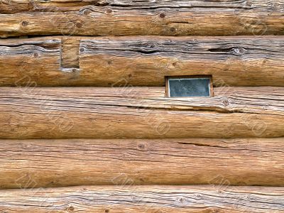 Window in house built from tree