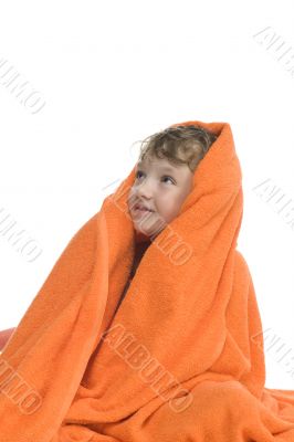 Boy in bath towel on white