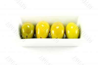 Four Green Olives in a Dish