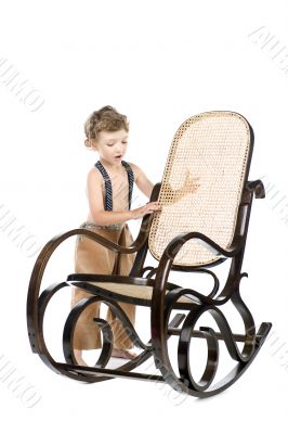 Boy and rocking chair