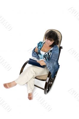 Woman reading magazine