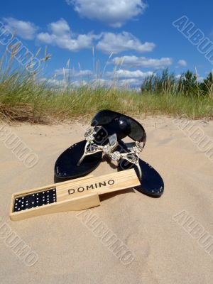 shoes sunglasses domino sand sky