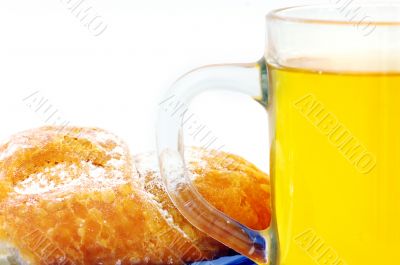 One croissant with cup of tea