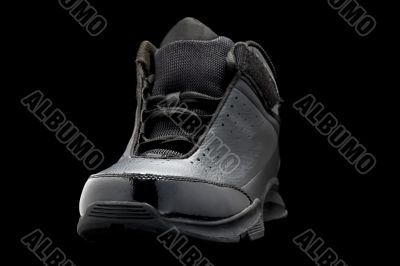 Sport shoes on black macro